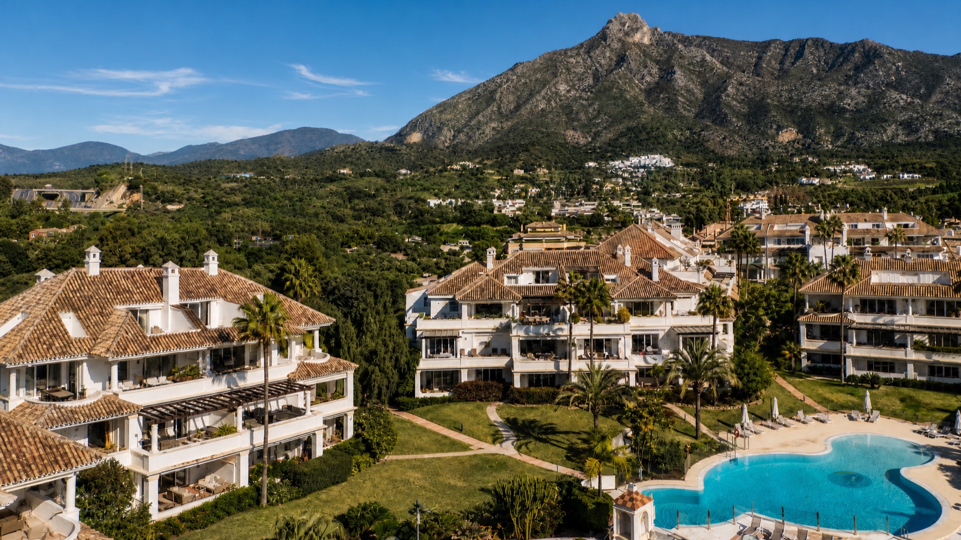 Aerial view of the community with the La Concha mountain backdrop
