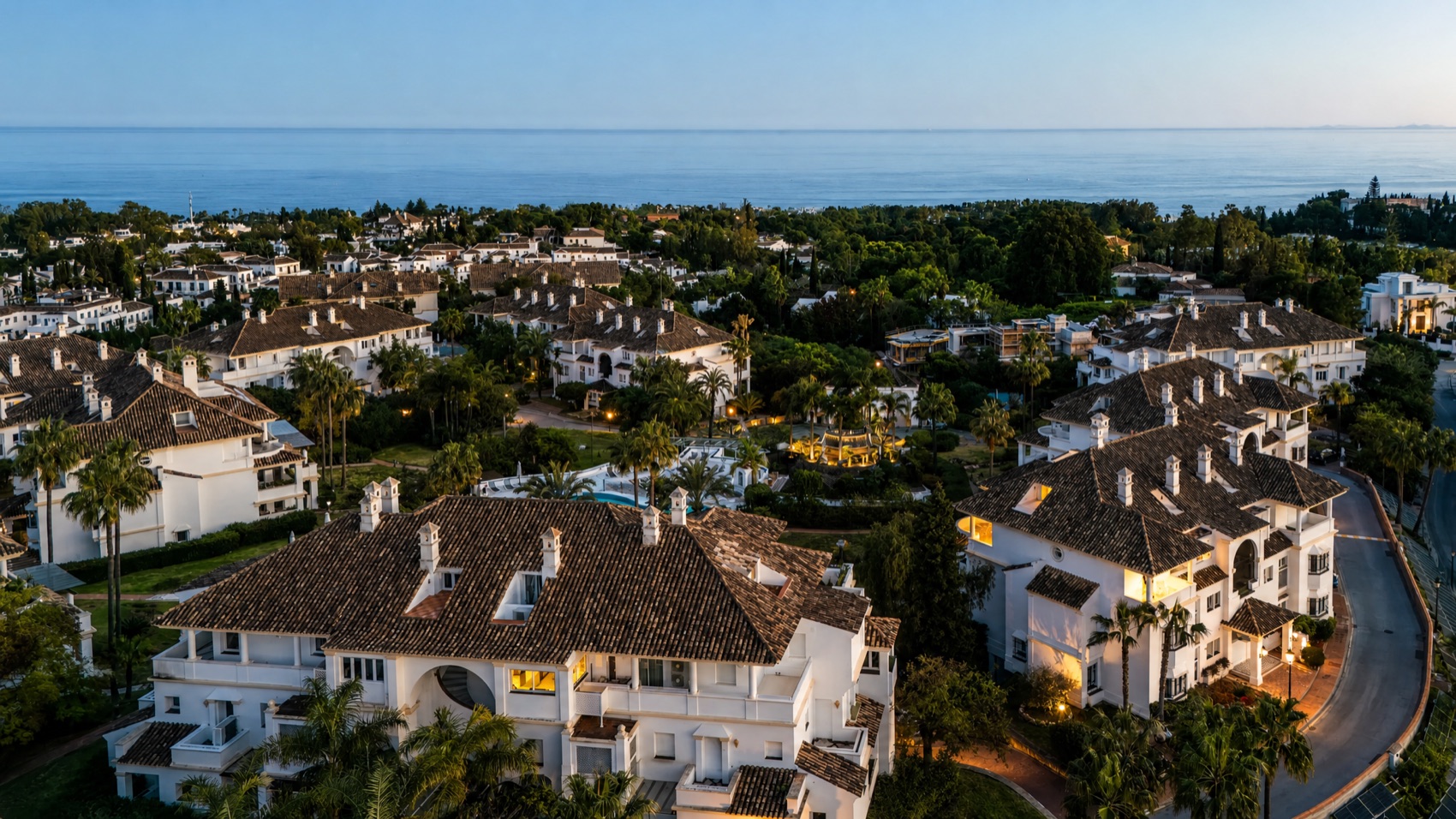 The community at dusk with sea views